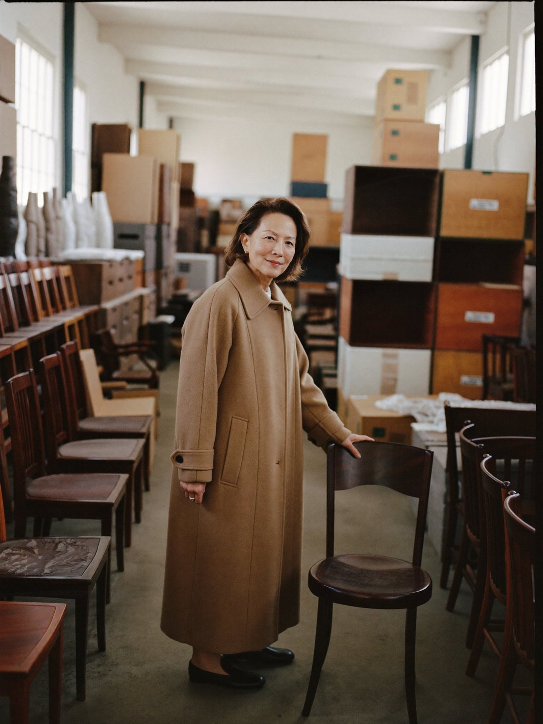 The founder of a furniture import business in her showroom warehouse