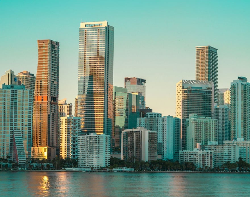 The Miami skyline across the water in late golden light